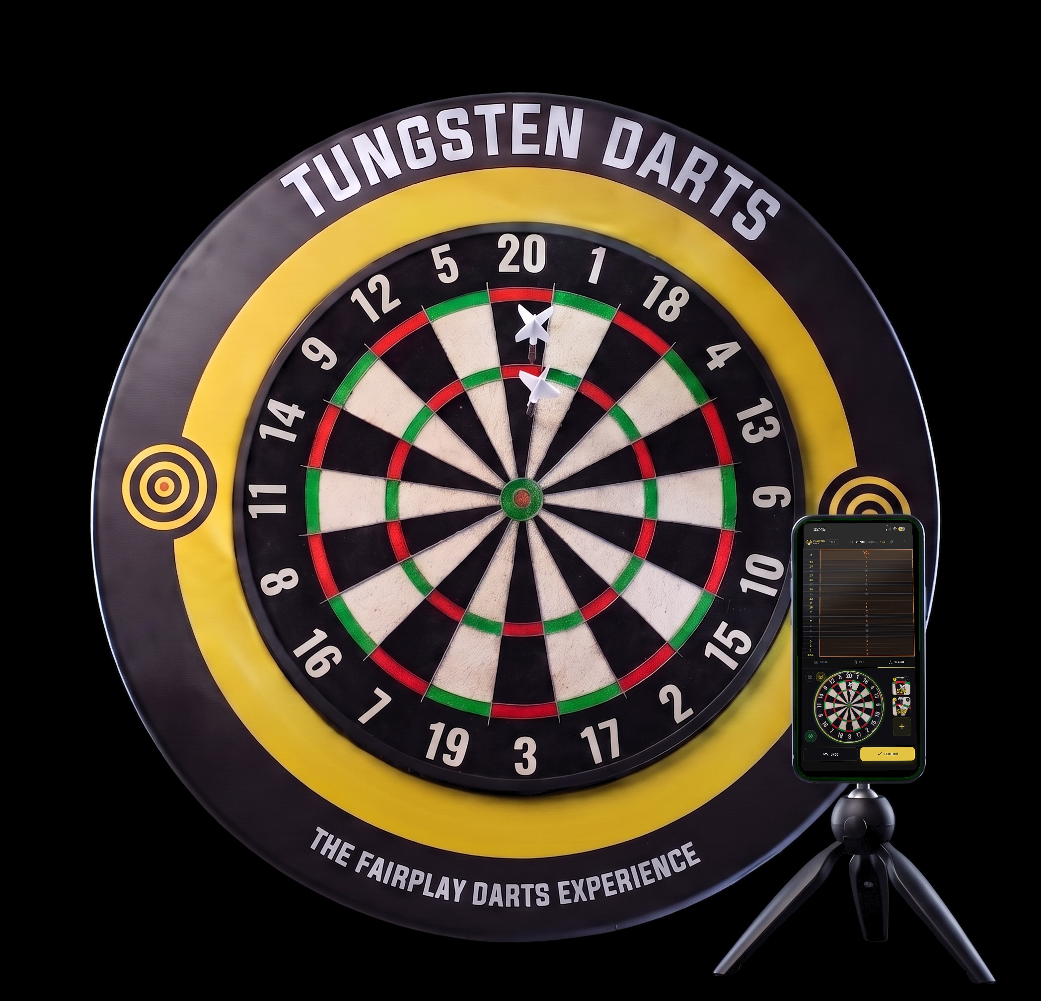 A phone on a small tripod in front of a Tungsten Darts dartboard